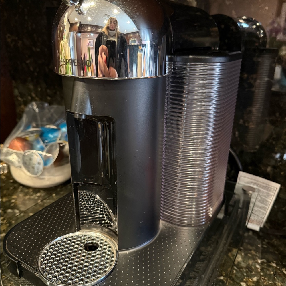 Nespresso Black and Chrome Coffee Maker